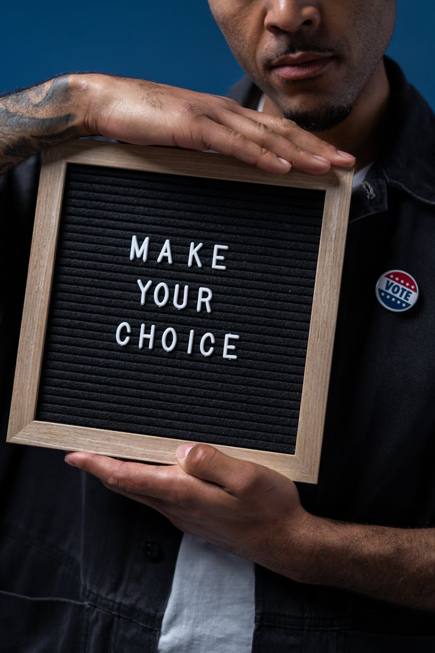 man holding a sign